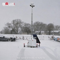 Tour de vidéosurveillance solaire 450W avec base sur chenilles, chargeur CA, boîtier CCTV hexagonal et mât télescopique pour la sécurité des chantiers