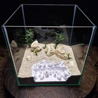Décoration d'aquarium de Noël : Maison de Père Noël dans la neige, cachette et grotte pour poissons, pour la décoration de l'aquarium, abri pour poissons
