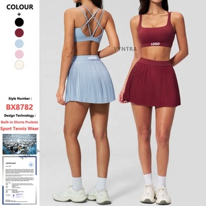 Ensemble de sport pour <span class=keywords><strong>femme</strong></span> avec logo personnalisé, séchage rapide, soutien-gorge de sport, mini-jupes plissées avec short intégré, pour le <span class=keywords><strong>golf</strong></span>, le pickleball, le tennis et l'entraînement - Product Image 1