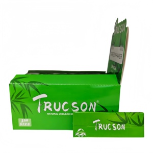 Papiers à rouler TRUCSON verts, format 1 1/4, fibres végétales naturelles, combustion lente, 50 feuilles + 50 filtres par carnet, 24 carnets par boîte - Product Image 4