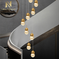 Lustre suspendu en cristal LED de luxe sur mesure pour la décoration intérieure de villas, hôtels, halls d'entrée, chambres et escaliers
