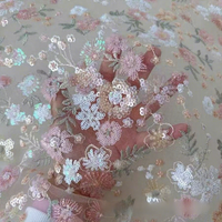 Tissu en dentelle brodée de sequins lourds et exquis pour robes de mariée et de soirée haut de gamme