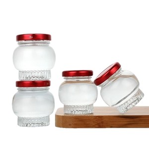 Bon marché Prix Vente en gros Bocal rond transparent de stockage des aliments Bocal <span class=keywords><strong>vide</strong></span> en verre à épices et miel 50ml 100ml <span class=keywords><strong>Mini</strong></span> bocal à <span class=keywords><strong>confiture</strong></span> en verre avec couvercle - Product Image 6