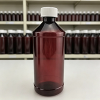 Vente directe usine – Bouteilles rondes en PET ambré de 250 ml avec bouchon à vis et boîte livret pour boissons (OEM)