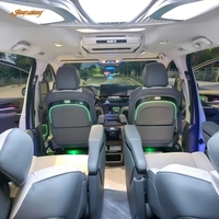 Meja Lipat Elektrik Carnival Sienna dengan Interior yang Ditingkatkan, Lampu Ambient, Sandaran Kursi Depan, dan Papan Meja Mobil