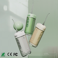 Grosir irigator Oral Mini IPX7 tahan air OEM/ODM perangkat pembersih gigi listrik Floss air gigi perjalanan rumah