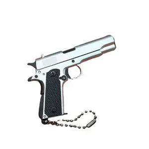 Tiktokミニチュア1911モデル1:3スケール縮小ピストル形状キーリングキーチェーンリングペンダントコルト1911おもちゃの銃