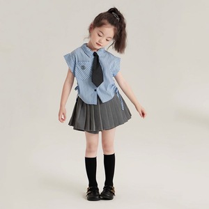 2023 estate nuovo abbigliamento Casual per bambini coreano da ragazza alla moda con Top senza maniche a righe verticali corto irregolare - Product Image 1