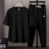 Vente en gros de streetwear tendance t-shirt à manches courtes pantalon décontracté pour homme ensemble deux-pièces pour couple de sports d'été pour hommes minces