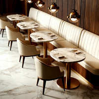 Ensemble de mobilier de restaurant Ron Group : table élégante en marbre, chaises en cuir, banquette sur mesure