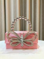 Sacs de soirée de luxe en forme de papillon, avec nœud en strass, pochette de mariage pour mariée, chaîne de perles, doublure en polyester, style tendance