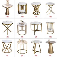 Base en acier inoxydable doré de luxe avec dessus en marbre blanc Table d'appoint de salon de beauté ronde moderne Petite table basse