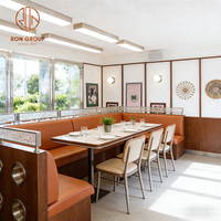 Table et chaise de restaurant rapide, canapé et banquette en marbre carré moderne, avec cadre en bois et revêtement en cuir, pour café.