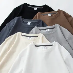 Chemises à manches longues décontractées vintage pour hommes unis designer en coton gaufré t-shirts tricotés polyvalents chemise ample d'automne lourde