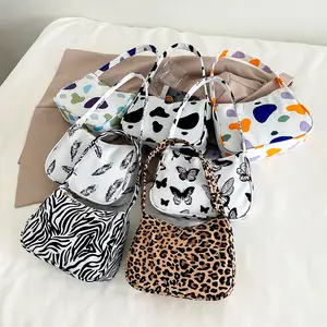 2024 nuevo bolso plisado de color sólido bolso simple para axilas de mujer bolso de moda al por mayor bolso de lujo con estampado de leopardo caliente