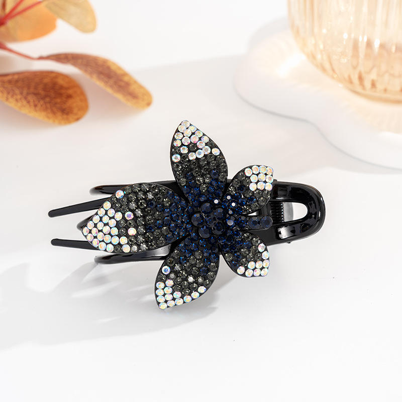 Clip à trois dents Leaf, bleu encre et gris.