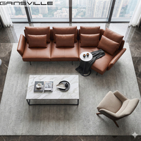 Ensemble de canapés de style italien pour salon, hall d'hôtel, canapé combiné, pieds en acier inoxydable, canapé en cuir orange, personnalisable