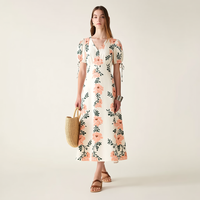 Robe d'été mi-longue personnalisée OEM ODM pour femme, imprimé floral crème, col en V, manches bouffantes, taille élastique, coupe trapèze