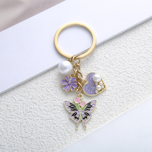 Porte-clés exquis en gros avec pendentifs papillon, fleur, coeur et perle - Product Image 3