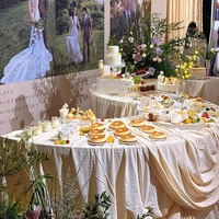 Table de mariage élégante table de buffet de dessert en métal gâteau en forme de S et pergola avec une capacité de charge élevée