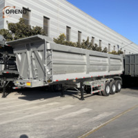 Semi-remorque benne arrière 3 essieux robuste avec vérin hydraulique pour le transport de déchets de construction et de marchandises