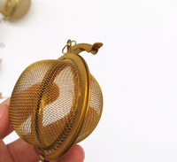 Boule d'infuseur à thé en acier inoxydable de taille personnalisée de 1,8 pouces 4.5cm avec chaîne Filtre à thé promotionnel pour outils de café et de thé