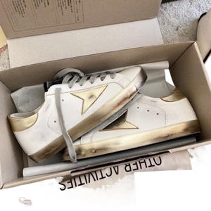 Chaussures de sport vulcanisées de créateur en cuir véritable, style vintage, à lacets, grandes tailles 45, pour hommes et femmes, avec détails dorés et motif étoile - Product Image 1