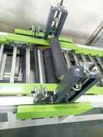 Machine à assembler les bords en bois massif Épandeur de colle pour bois laminé à double chaîne avec moteur pour bois articulé au doigt par
