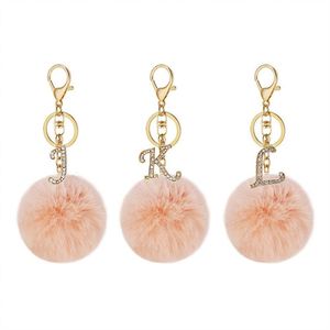 Llavero DIY de 26 letras inglesas con diamantes brillantes, bola de pelo de conejo, llavero de felpa con cristal, llavero de metal para bolso, regalo de joyería al por mayor - Product Image 5