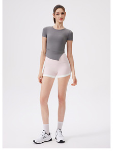 Camiseta deportiva de yoga para mujer, cuello redondo, corte ajustado, dobladillo curvo irregular, manga corta, transpirable, para gimnasio, pilates y entrenamiento. - Product Image 4