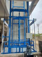 Monte-charge vertical hydraulique sur rail de guidage de 2 tonnes pour le transport de marchandises en usine de transformation