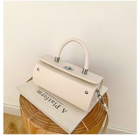 Sac à main rétro en forme de cylindre pour femmes, sac bandoulière en cuir PU avec fermoir métallique et poignée supérieure