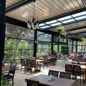 Pergola motorisée en aluminium avec persiennes rétractables pour un confort en toutes saisons - Product Image 1