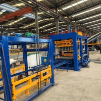 Machine de fabrication de blocs creux entièrement hydraulique QT6-15, machine automatique de fabrication de pavés colorés et de briques de ciment autobloquantes en Ouganda