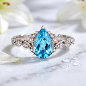 Bague de fiançailles en argent sterling 925 avec topaze bleue suisse taille poire et motif feuille de vigne, bijoux personnalisés en pierres précieuses, fabricant grossiste - Product Image 6