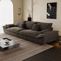Canapé d'angle modulable en tissu rembourré au design moderne, en forme de L, pour salon