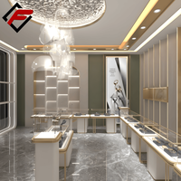 Comptoir d'exposition LED personnalisable avec finition peinte pour magasins de beauté, parfumeries, et boutiques de perruques – Vitrine en verre trempé