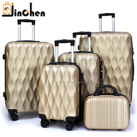 Vente en gros de bagages à main de luxe en ABS ensemble de valises nouveau design moderne classique coque dure fermeture éclair étanche pour les voyages à l'aéroport