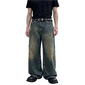 Jeans unisexe en denim bleu délavé, coupe large, style streetwear décontracté - Product Image 1