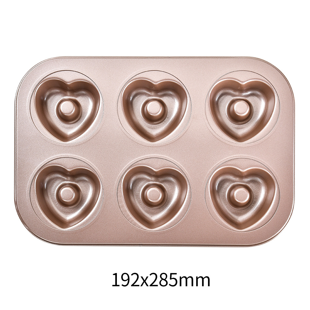 a forma di cuore dorato