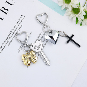 Nouveau Résine Or Arc Argent Coeur Alliage Porte-clés Petite Décoration Pendentif Sac Téléphone Cas Ornement - Product Image 3