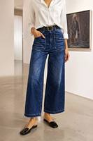 Jean pour femme taille haute, coupe large, noir, avec poches plaquées effet pierre, style baggy, ceinture et boucle dorée, minimaliste