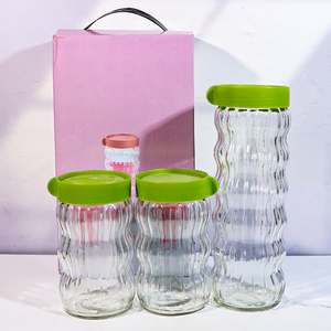 Suministros de cocina para el hogar Botella de grano de vidrio hermético Juego de tarros de almacenamiento de refrigerios Tarro de condimento de vidrio para alimentos con tapa - Product Image 2