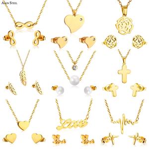 Conjunto de Joyería de Moda para Mujer, Collar y Aretes de Perlas Minimalistas con Cruz, Corazón y Mariposa en Acero Inoxidable con Baño de Oro de 18K, Ideal para Regalo - Product Image 1