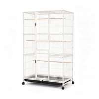 Grande cage d'élevage blanche à trois niveaux avec accessoires complets et support mobile pour l'élevage en groupe de petits et moyens perroquets