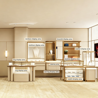 Meubles de présentation pour bijouterie de luxe, solution complète d'aménagement de boutique, vitrine à bijoux en verre couleur or champagne, îlot de présentation