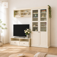 Meuble TV haut de gamme XINGRUO avec unités murales intégrées, meuble de rangement et vitrine en bois blanc crème sur mesure pour salon