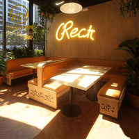 Canapés en forme de L personnalisés avec un espace privé, associés à des tables à cadre en acier inoxydable, sont le choix idéal pour les restaurants