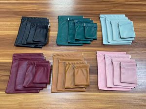 Factory Wholesale Multi Size Self Closing Leather Snap Pouch Custom Logo Spring Top Jewelry Watch Storage Leather Bag In Stock - Product Image 1