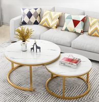 Table basse ronde simple de petite taille en bois noir pour salon, style moderne et luxueux, pour petite famille